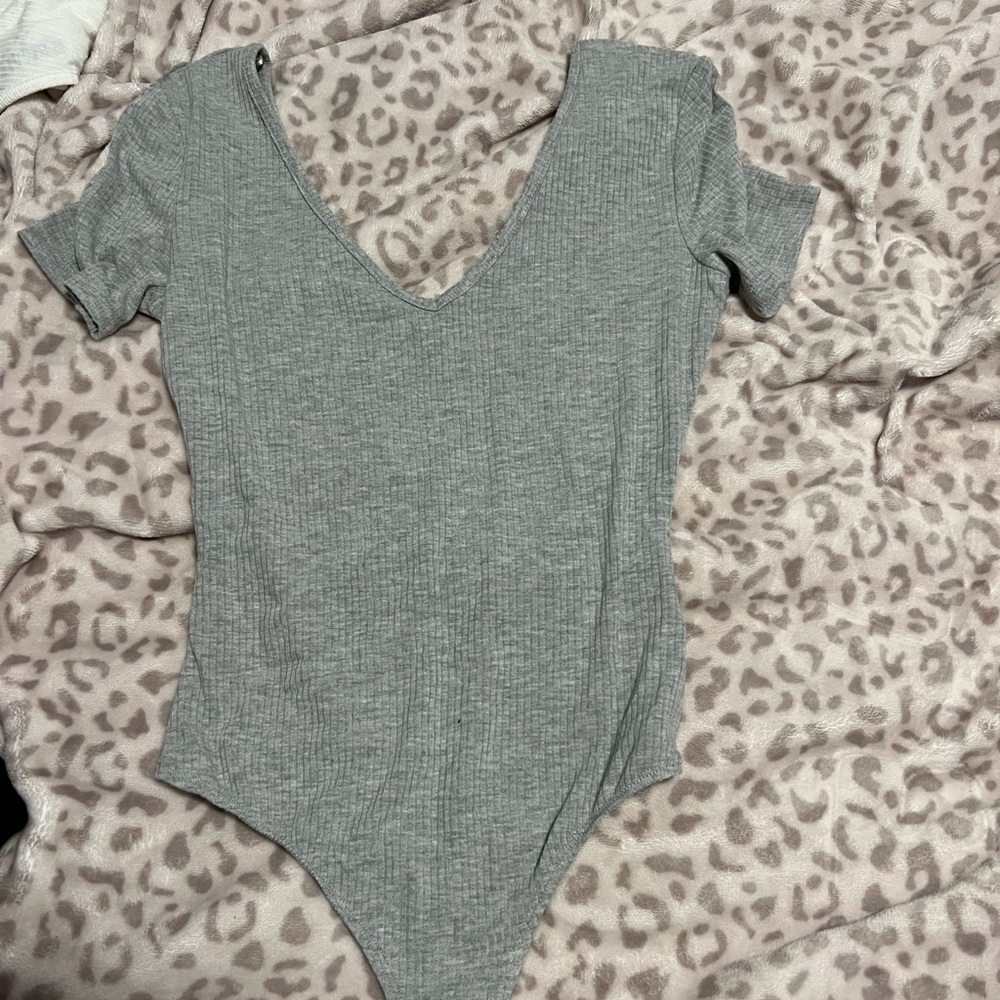 Grey body suit thong